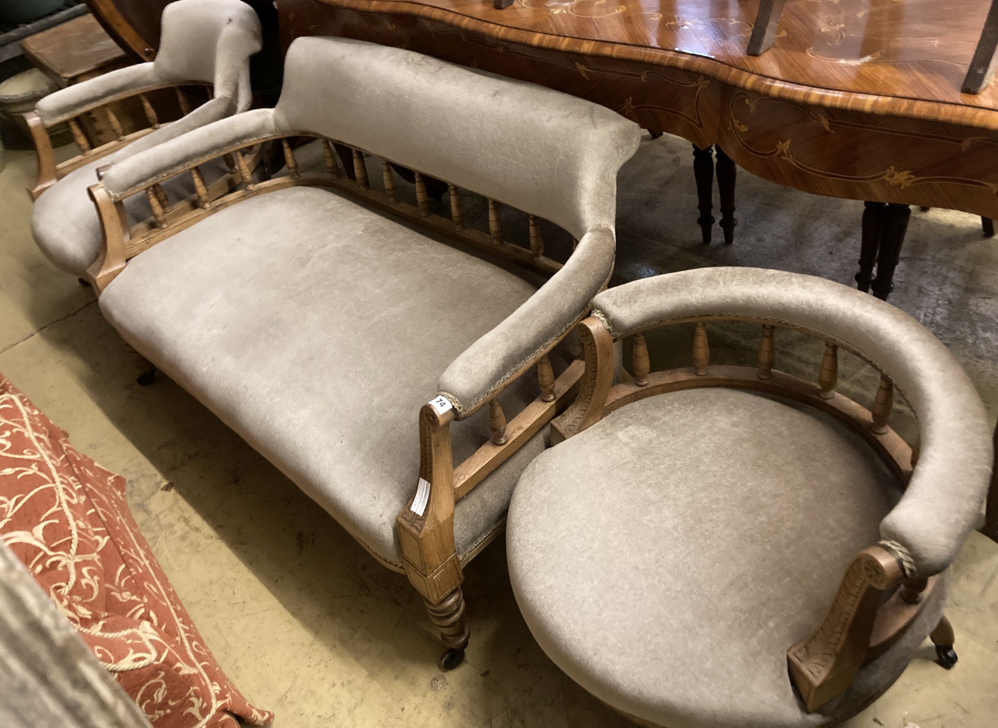 A late Victorian mahogany framed three piece salon suite, settee length 128cm, depth 70cm, height 68cm